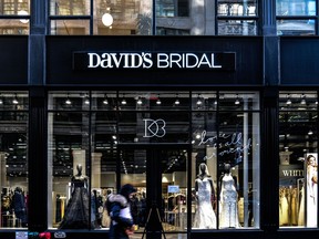 A pedestrian walks past a David's Bridal LLC store in Manhattan, New York.