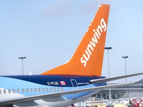 A Sunwing Airlines aircraft parked at the Montréal–Trudeau International Airport.