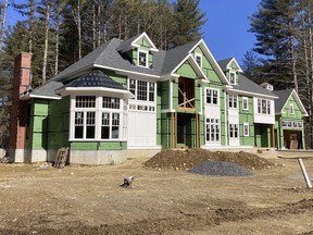 A home under construction at a development in Sudbury, Ma., on Sunday, March 12, 2023. On Thursday, Freddie Mac reports on this week's average U.S. mortgage rates.