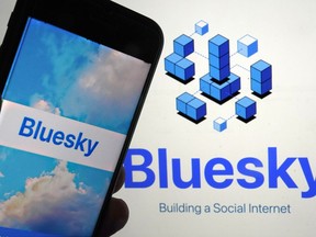 The app for Bluesky is shown on a mobile phone, left, and on a laptop screen, in New York, Friday, June 2, 2023. Bluesky, the internet's hottest members-only spot at the moment, does feel a bit like an exclusive club, populated by some Very Online folks, popular Twitter characters as well as fed up ex-users of the Elon Musk-owned platform.