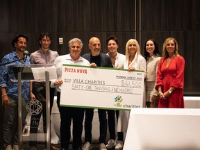 The Primucci Family presents a cheque in the amount of $61,500 to Villa Charities. Marco DeVouno, President and Chief Executive Officer, Villa Charities accepts the donation in support of Villa Colombo, its Toronto long-term care home, on June 5, 2023.  (From left to right) Mike Primucci, Lucas Primucci, Marco DeVouno (President and Chief Executive Officer, Villa Charities), Domenic Primucci, Samual Primucci, Anna Primucci, Gemma Primucci, Lori Primucci