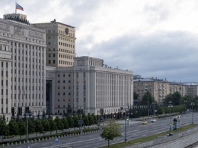 A view of the Russian Defense Ministry building with anti-aircraft artillery systems atop the roof in Moscow, Saturday, June 24, 2023. (AP Photo)