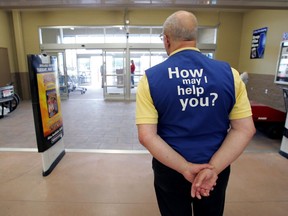 A senior working as a Walmart greeter in a store in Ohio.