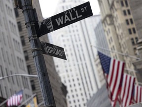 A "Wall Street" sign near the New York Stock Exchange