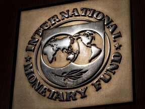 FILE - The logo of the International Monetary Fund is visible on its building, April 5, 2021, in Washington. The IMF slammed Pakistan's government on Thursday, June 15, 2023, over its proposal for the new annual budget, saying it failed to implement a more fair tax system in the draft.