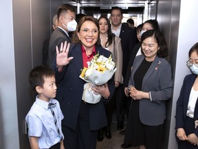 In this photo released by China's Xinhua News Agency, Honduras' President Xiomara Castro waves as she arrives in Shanghai, China, Friday, June 9, 2023. Honduran President Xiomara Castro arrived in Shanghai on Friday on her first visit since China established ties with Honduras, pulling it away from former diplomatic ally Taiwan.