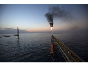 Gas flares from a tower on a Petroleos Mexicanos offshore facility near Ciudad del Carmen, Mexico.