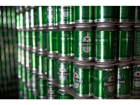 Cans of Heineken beer sit stacked in the bottling plant at the Heineken NV brewery in Yangon, Myanmar, on June 15, 2017. Heineken is seeking to exploit the potential of the southeast Asian nation where more than 80 percent of the adult population drinks beer. Beer sales in Myanmar rose 14 percent to $265 million between 2009 and 2013, and are forecast to reach $675 million by 2018, according to Euromonitor.