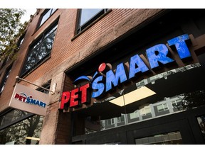 Signage outside a PetSmart store in the Brooklyn borough of New York, U.S., on Tuesday, Oct. 27, 2020. PetSmart Inc. is kicking off a $2.35 billion junk bond offering as part of a larger financing package that will separate the company from its online counterpart Chewy Inc. Photographer: Mark Kauzlarich/Bloomberg