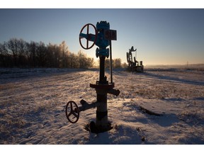 Valve control wheels connected to crude oil pipework in an oilfield near Dyurtyuli, in the Republic of Bashkortostan, Russia, on Thursday, Nov. 19, 2020. The flaring coronavirus outbreak will be a key issue for OPEC+ when it meets at the end of the month to decide on whether to delay a planned easing of cuts early next year. Photographer: Andrey Rudakov/Bloomberg