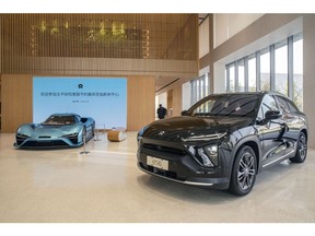 A Nio ES6, right, and EP9, inside a Nio House. Photographer: Qilai Shen/Bloomberg