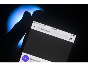 The Facebook page for Bloomberg News is blocked on a smartphone in Sydney after Australia passed a similar law in 2021. Photographer: Brent Lewin/Bloomberg