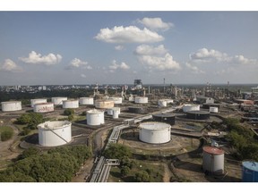 Storage tanks at the Ecopetrol Barrancabermeja refinery in Barrancabermeja, Colombia, on Tuesday, Feb. 15, 2022. Ecopetrol says it expects organic investments in the range of $17b-$20b for 2022-2024, of which 69% is expected to be for upstream projects. Photographer: Ivan Valencia/Bloomberg