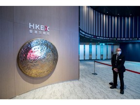 A gong inside the Hong Kong Stock Exchange in Hong Kong, China, on Wednesday, July 13, 2022. Hong Kong is likely to see more dual-traded companies shift toward primary listings in the financial hub as they seek inclusion in trading links with mainland China, according to the exchange's Chief Executive Officer Nicolas Aguzin. Photographer: Paul Yeung/Bloomberg