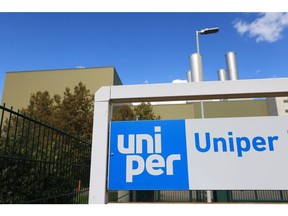 Signage for Uniper SE outside the company's Kirchmoeser natural gas power plant in Brandenburg, Germany, on Wednesday, Sept. 21, 2022. Germany will nationalize Uniper in a historic move to rescue the country's largest gas importer and avert a collapse of the energy sector in Europe's biggest economy. Photographer: Krisztian Bocsi/Bloomberg