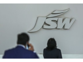 A signage of JSW Steel Ltd. at company's headquarters in Mumbai, India, on Monday, Jan. 23, 2023. Tycoon Sajjan Jindal-controlled JSW Steel Ltd. plans to take advantage of lower rupee borrowing costs to refinance its offshore borrowings, as it pushes to increase capacity with a $6 billion capital expenditure plan. Photographer: Dhiraj Singh/Bloomberg