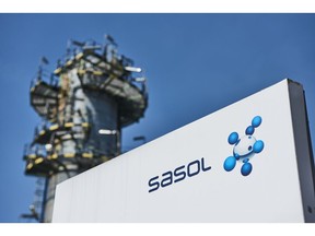 A sign at the Sasol Ltd. Sasol One liquid fuels facility in Sasolburg, South Africa, on Thursday, Feb. 24, 2023. Sasol, South Africa's second-biggest producer of greenhouse gases, set a target of cutting its emissions of climate-warming pollutants by 30% by 2030 and said it aims to have net-zero emissions by 2050.