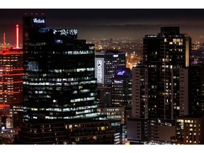 Commercial high-rise office buildings at night in Cape Town, South Africa, on Thursday, June 1, 2023. Cape Town, South Africa's second-largest city, is in talks with Eskom Holdings SOC Ltd. to take over the supply of electricity in areas of the metro served by the state power utility.