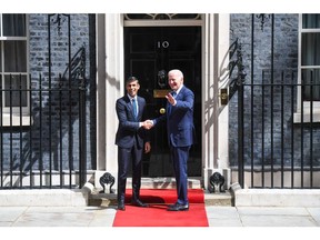 Rishi Sunak greets President Joe Biden outside 10 Downing Street in London on July 10. Photographer: Chris J. Ratcliffe/Bloomberg