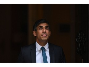 Rishi Sunak, UK prime minister, departs 10 Downing Street to attend a questions and anwswers session in Parliament in London, UK, on Wednesday, July 19, 2023. Sunak's popularity rating sank to its lowest level since he became UK prime minister in October, highlighting the growing challenge he faces in leading his party to victory at the next general election.
