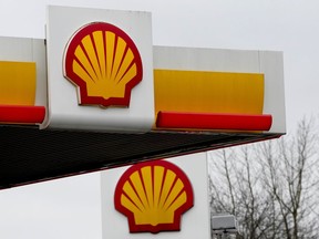 Shell signs at a gas station