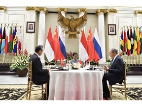 Indonesian Foreign Minister Retno Marsudi with Wang Yi and Sergey Lavrov during their trilateral meeting in Jakarta on July 12. Photographer: Indonesia Foreign Affairs Ministry/Anadolu Agency/Getty Images