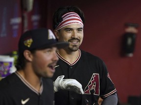 Arizona Diamondbacks' Corbin Carroll smiles after his home run against the New York Mets during the first inning of a baseball game Tuesday, July 4, 2023, in Phoenix.