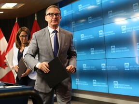 Bank of Canada governor Tiff Macklem and senior deputy governor Carolyn Rogers leave a news conference after announcing Bank's latest rate hike on July 12.