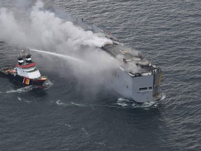 Dutch firefighters continued to battle the fire on the Fremantle Highway suspected to have been started by electric cars. The Panamanian-flagged vessel remained tethered to a salvage ship to keep it in position some 14.5 nautical miles north of the Dutch island of Ameland. One sailor died and several others were injured after a fire broke out on the car carrier ship on July 26.