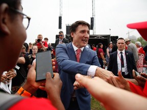 Justin Trudeau greets people during Canada Day celebrations in Ottawa this month.