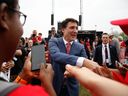 Prime Minister Justin Trudeau greets people during Canada Day celebrations in Ottawa this month.