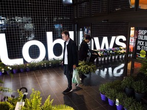 A man leaves a Loblaws store in Toronto on Thursday, May 3, 2018.