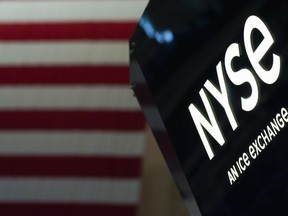 An NYSE sign is seen on the floor at the New York Stock Exchange.