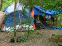 A homeless camp on the River Thames in London, Ontario.  Housing affordability has become a pressing issue in communities of all sizes, increasing homelessness rates and driving outmigration from the province, says the Ontario Chamber of Commerce. 