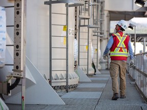 A worker at LNG Canada's site in Kitimat, B.C.