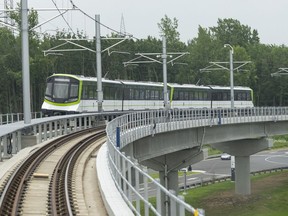 A Réseau express métropolitain (REM) light-rail system train