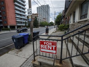 A 'for rent' sign outside a home in Toronto.