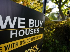 FILE - A sign is seen near a home being remodeled, Wednesday, Oct. 12, 2022, in Towson, Md. Would-be homebuyers are willing to take on sharply higher mortgage payments, even as home prices have begun to pull back in 2023.