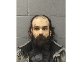 FILE - This booking photo provided by Massachusetts State Police on March 7, 2023, shows Francisco Severo Torres. Torres, who is charged with attacking a flight attendant with a broken metal spoon and attempting to open an airliner's emergency door on a cross-country flight in March, does not understand the nature and consequences of the case against him, a mental health evaluation concluded on Wednesday, July 13. (Massachusetts State Police via AP, File)