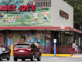 FILE - Customers walk to a Trader Joe's market, Aug. 13, 2019, in Cambridge, Mass. Trader Joe's is recalling two of its cookie products because they may contain rocks, the grocery chain announced Friday, July 21, 2023.