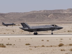 FILE - An Israeli F-35 lands at Ovda airbase during the bi-annual multi-national aerial exercise known as the Blue Flag, at Ovda airbase near Eilat, southern Israel, Sunday, Oct. 24, 2021. Israel will buy 25 F-35 aircraft from the United States, the Israeli Defense Ministry announced Sunday, July 2, 2023, in a deal that increases Israel's arsenal of the stealth fighter jets by 50%.