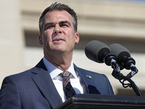 FILE - Oklahoma Gov. Kevin Stitt speaks during inauguration ceremonies Jan. 9, 2023, in Oklahoma City. The Oklahoma House has voted to override Gov. Stitt's veto of a bill to extend existing agreements with Native American tribes on the sale of tobacco for another year.