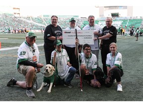 The Brandt Group of Companies chose the July 7th Saskatchewan Roughriders vs Edmonton Elks CFL football game as the venue to announce an unprecedented $2 million donation to the Saskatchewan branch of the Canadian National Institute for the Blind. The cheque presentation occurred during the first quarter with (from left to right) Shaun Semple, Brandt CEO; Christall Beaudry, CNIB's Vice President of Western Canada; John M. Rafferty, President and CEO of CNIB; and Gavin Semple, Brandt's Chairman participating along with the CNIB support team.