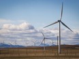 TransAlta Corp. says it has signed an agreement to acquire the minority stake in TransAlta Renewables Inc. that it does not already own. A TransAlta wind farm is shown near Pincher Creek, Alta.