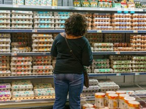 A person shops for eggs at a Whole Foods store in Atlanta.