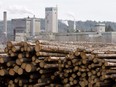 Logs are piled up at a West Fraser Timber site.