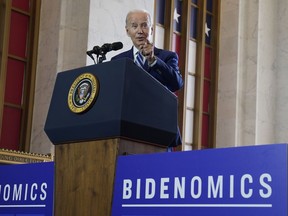 FILE - President Joe Biden delivers remarks on the economy, Wednesday, June 28, 2023, at the Old Post Office in Chicago. Biden has long struggled to neatly summarize his sprawling economic vision. On Wednesday, the president gave a speech on "Bidenomics" in the hopes that the term will lodge in voters' brains ahead of the 2024 elections. But what is Bidenomics? Let's just say the White House definition is different from the Republican one -- evidence that catchphrases can be double-edged.