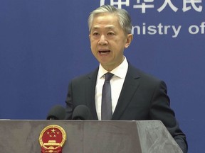 Chinese Foreign Ministry spokesperson Wang Wenbin speaks during the daily briefing in Beijing, Friday, July 14, 2023. China on Friday criticized a German government call for reducing dependency on Chinese products and reducing other potentially unstable factors in bilateral relations, calling it a form of protectionism.