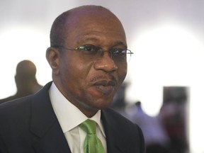 Former Central Bank of Nigeria governor, Godwin Emefiele, attends an event in Lagos, Nigeria, Monday, May 22, 2023. Nigeria's suspended central bank governor detained for more than a month has been charged following a court directive, the secret police said Thursday, July 13. Emefiele of the Central Bank of Nigeria was charged after he was investigated for alleged "criminal infractions," said Peter Afunanya, spokesman for the secret police, the Department of State Services.