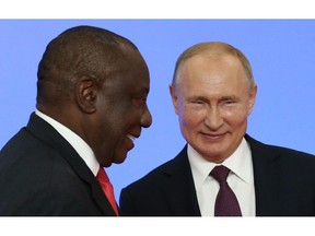 SOCHI RUSSIA - OCTOBER,23 (RUSSIA OUT) Russian President Vladimir Putin (R) greets South African President Cyril Ramaphosa (L) during the welcoming ceremony at the Russia-Africa Summit in Black Sea resort of Sochi, Russia, October 23, 2019. Leaders of African countries have gathered in Sochi for two-days summit.